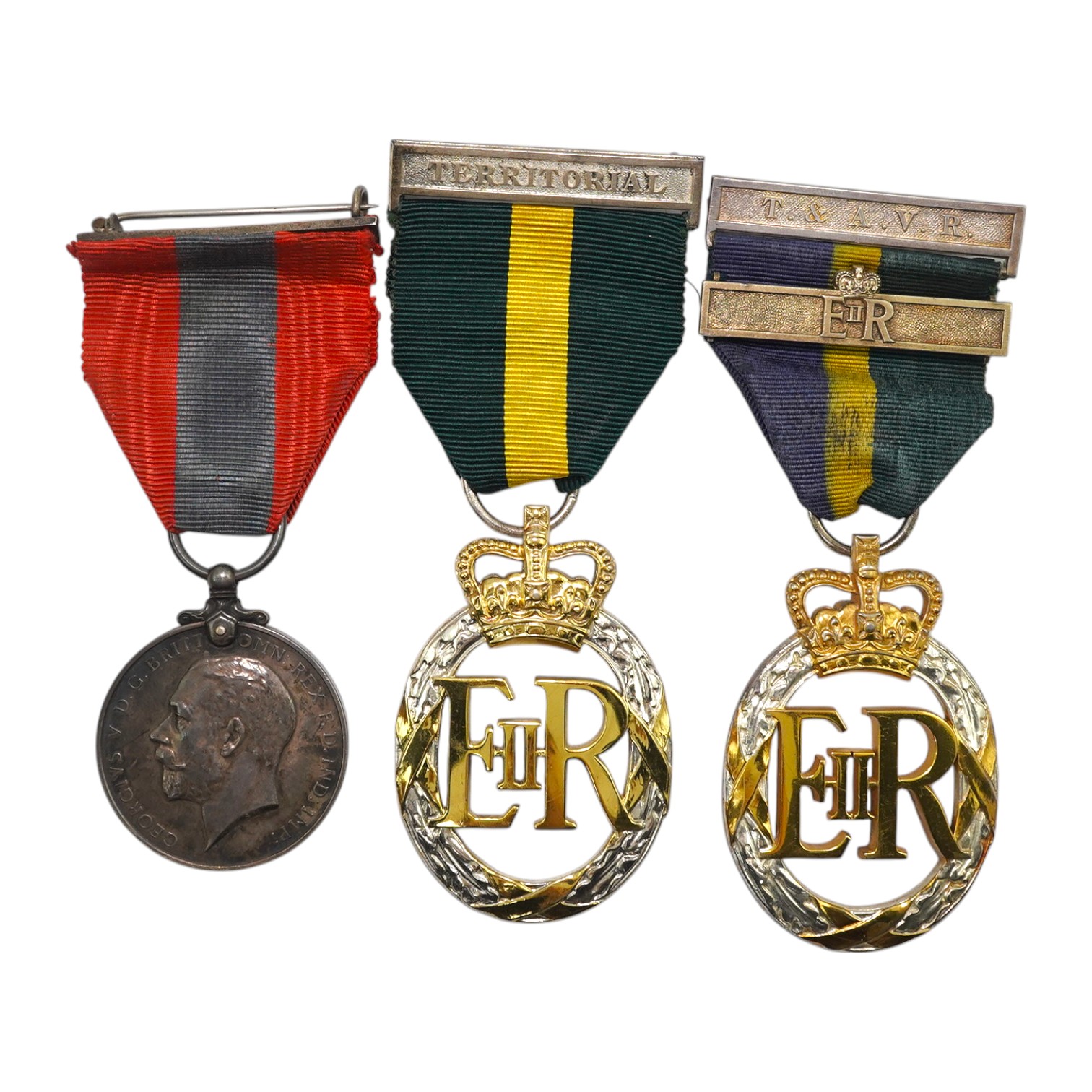 Three assorted service medals; Imperial Service medal to Henry Chillingworth; Territorial Efficiency Decoration 1964; T&A.V.R Efficiency Decoration 1970. All cased. Condition - good.